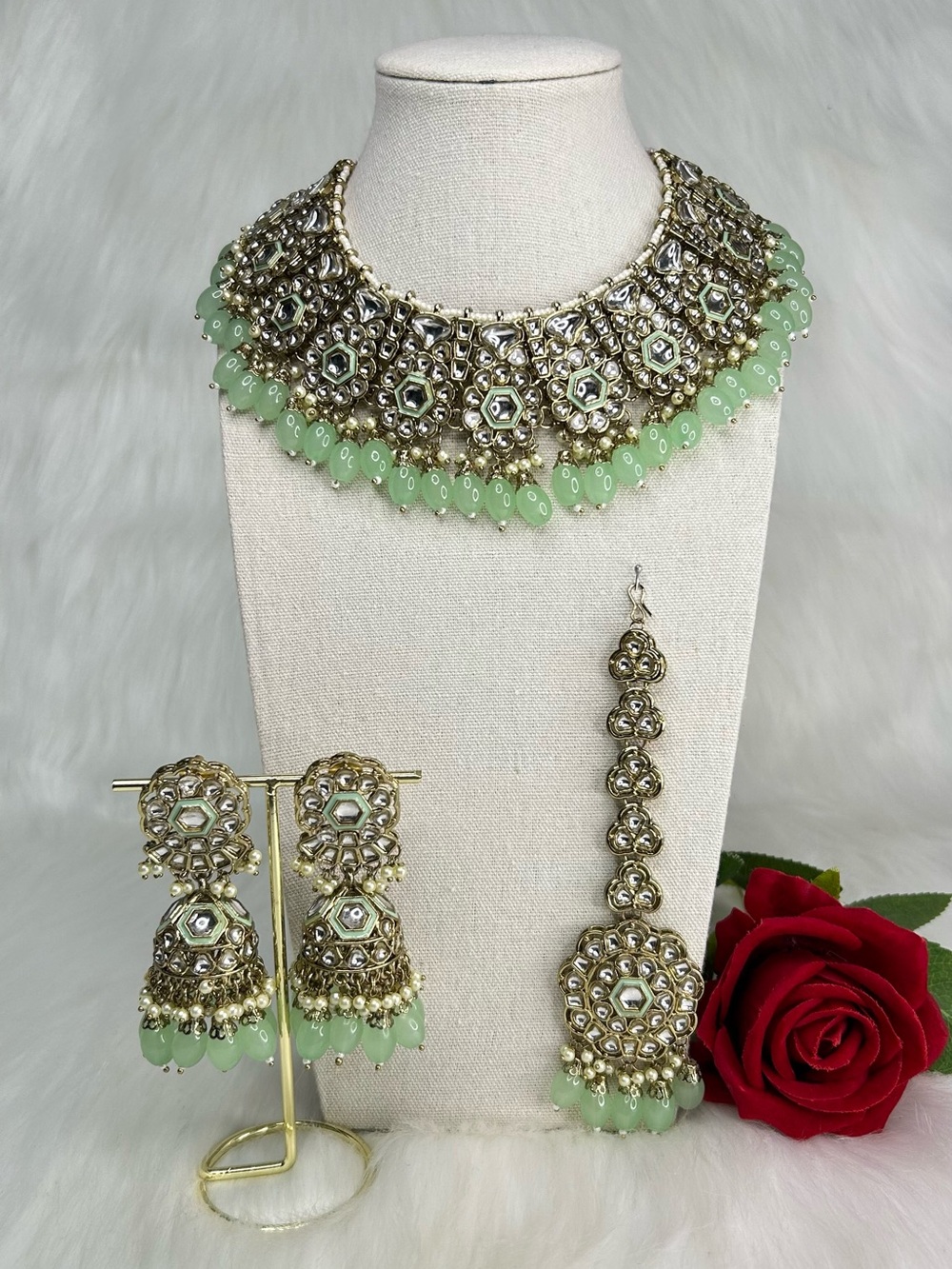 Beautiful Gold and Mint Kundan Statement Necklace Set With Jhumka And Tikka